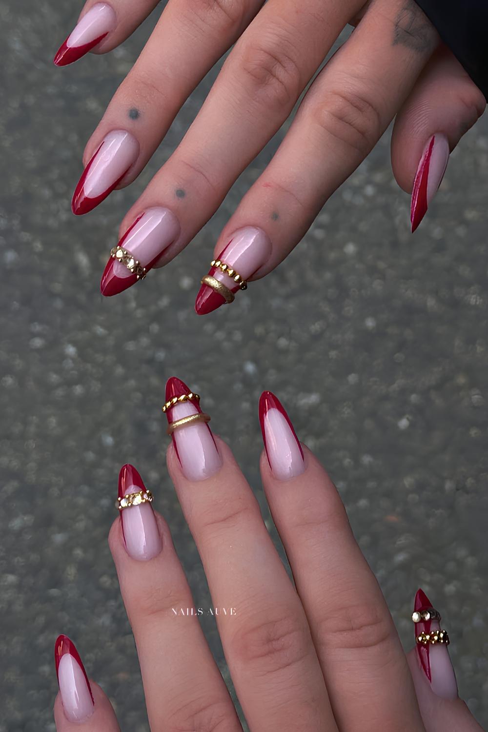Red French mani with gold bangle inspired art