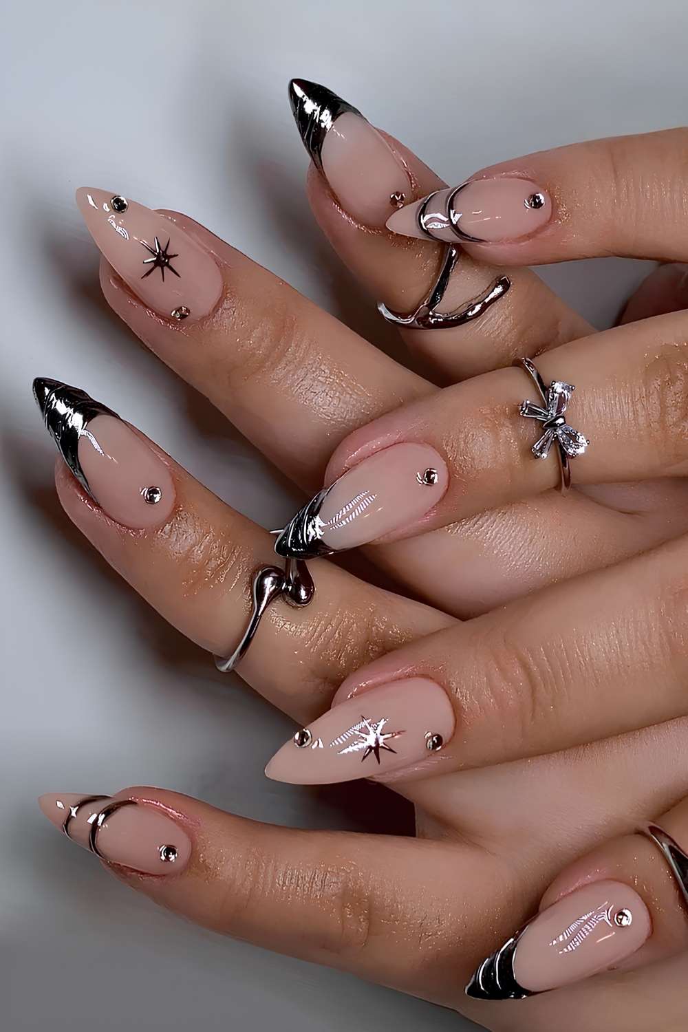 Silver French nails with gems and stars