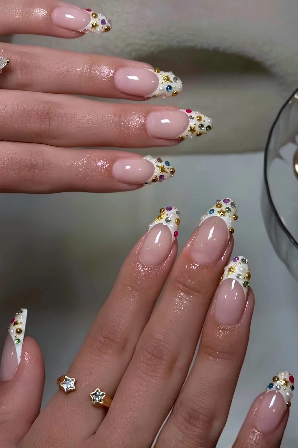 White French mani with colorful micro gems