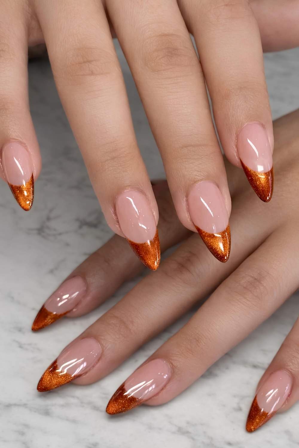Burnt orange cat eye French nails