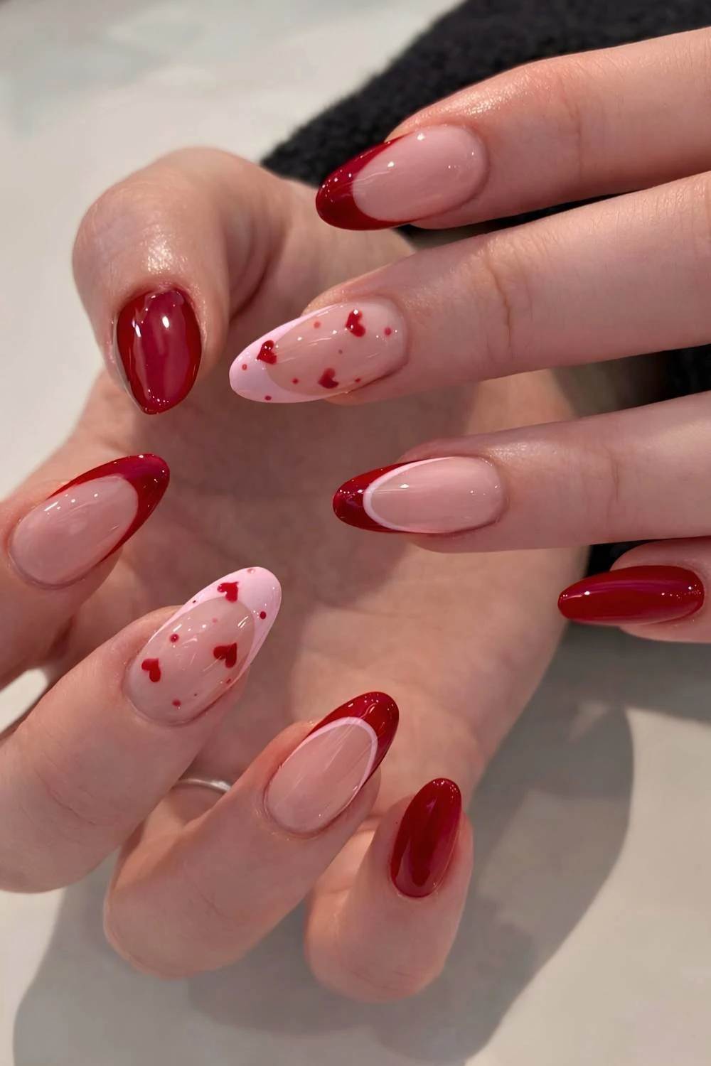 Cherry red and pink nails with hearts