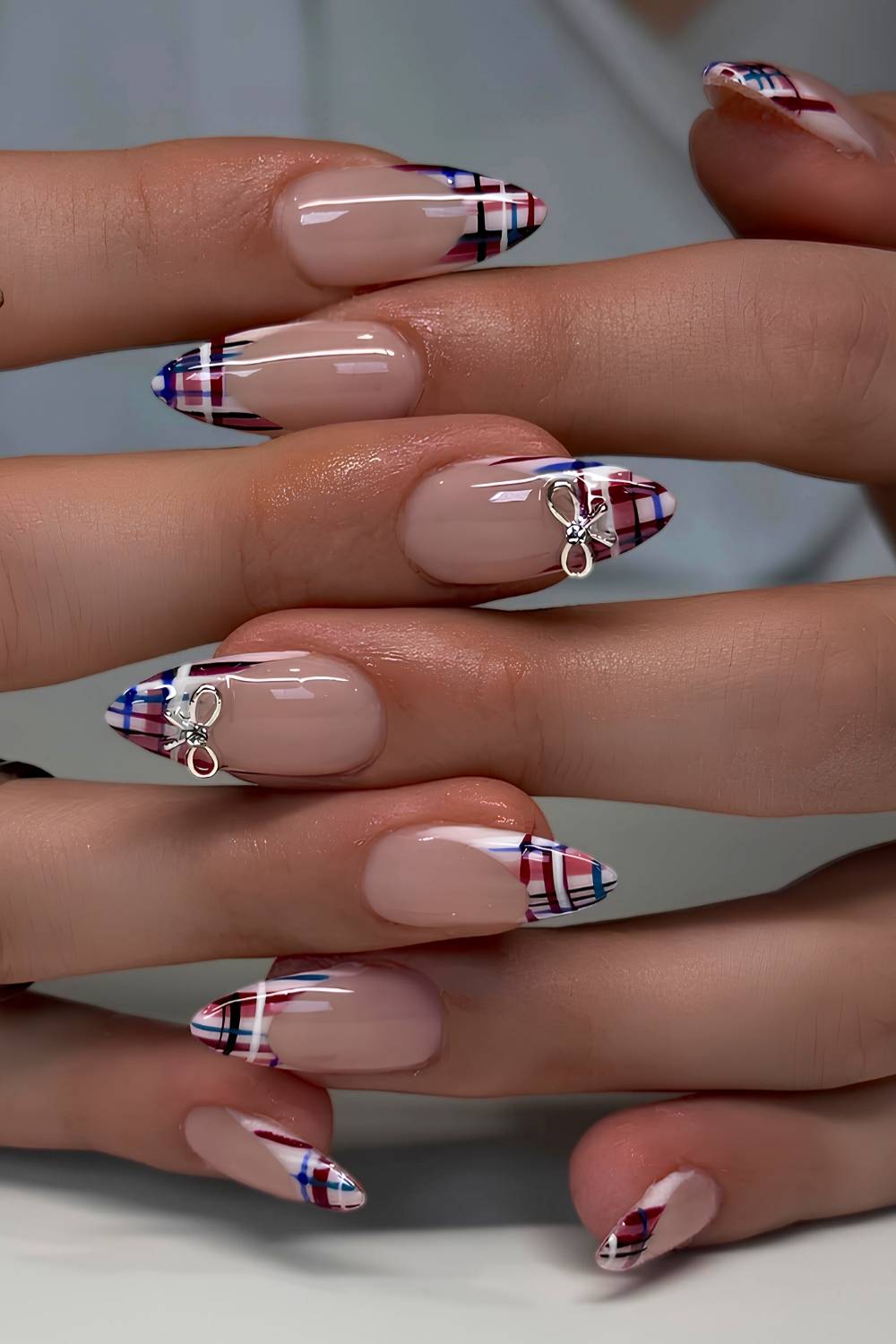 Colorful plaid French mani with bows