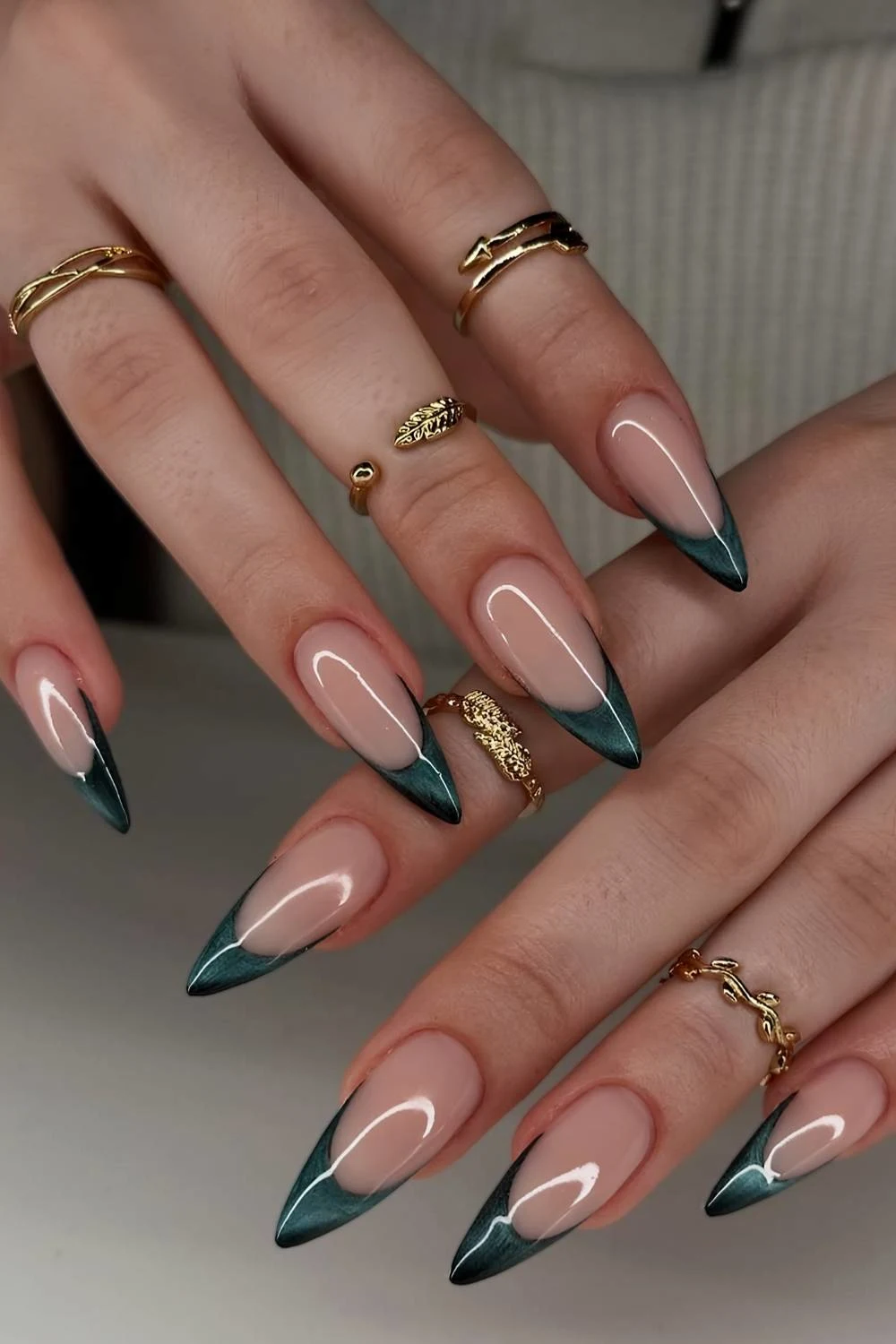 Dark green cat eye French tip manicure