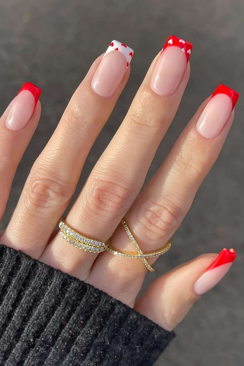 Red French mani with white micro hearts