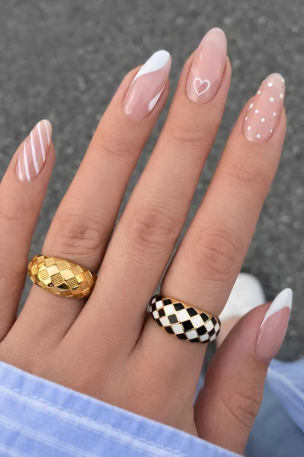Sheer nails with white hearts and dots