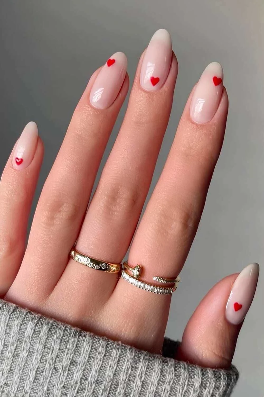Sheer white mani with red hearts