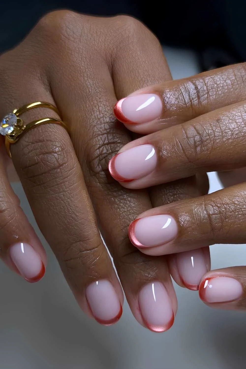 Short pink cat eye French mani