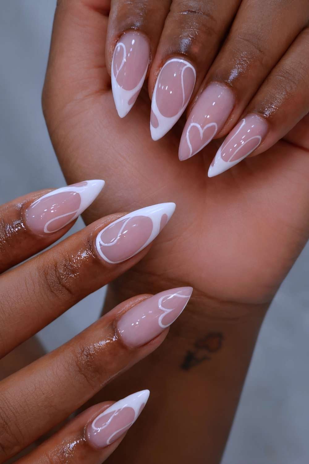White French mani with abstract heart art