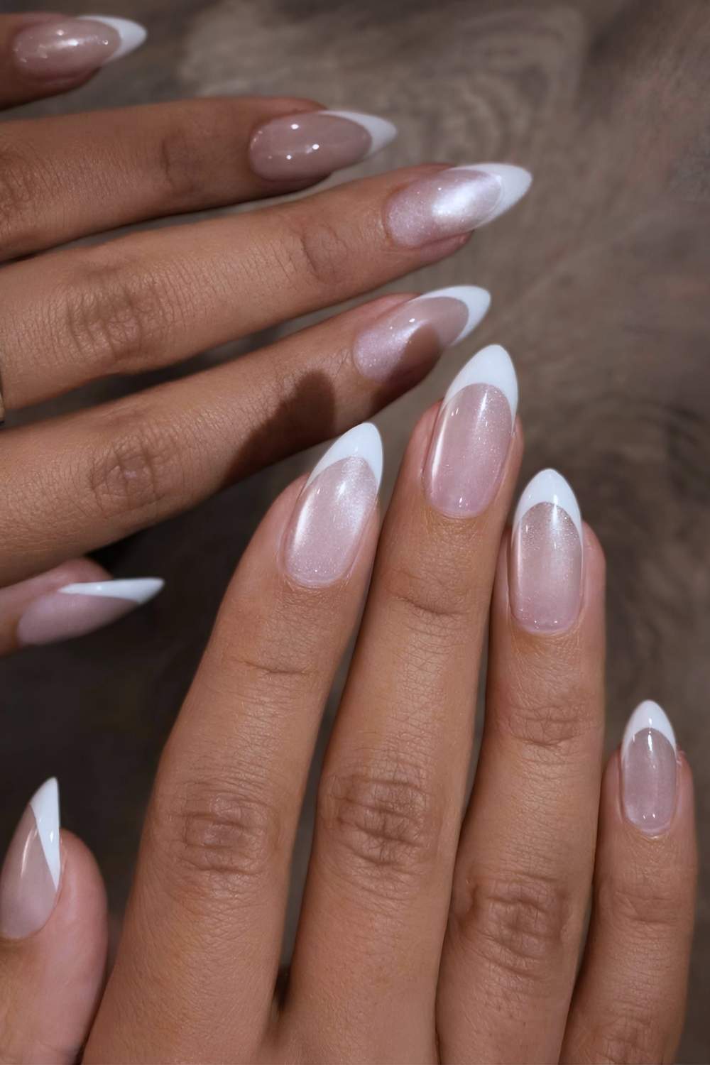 White French tip nails on cat eye base