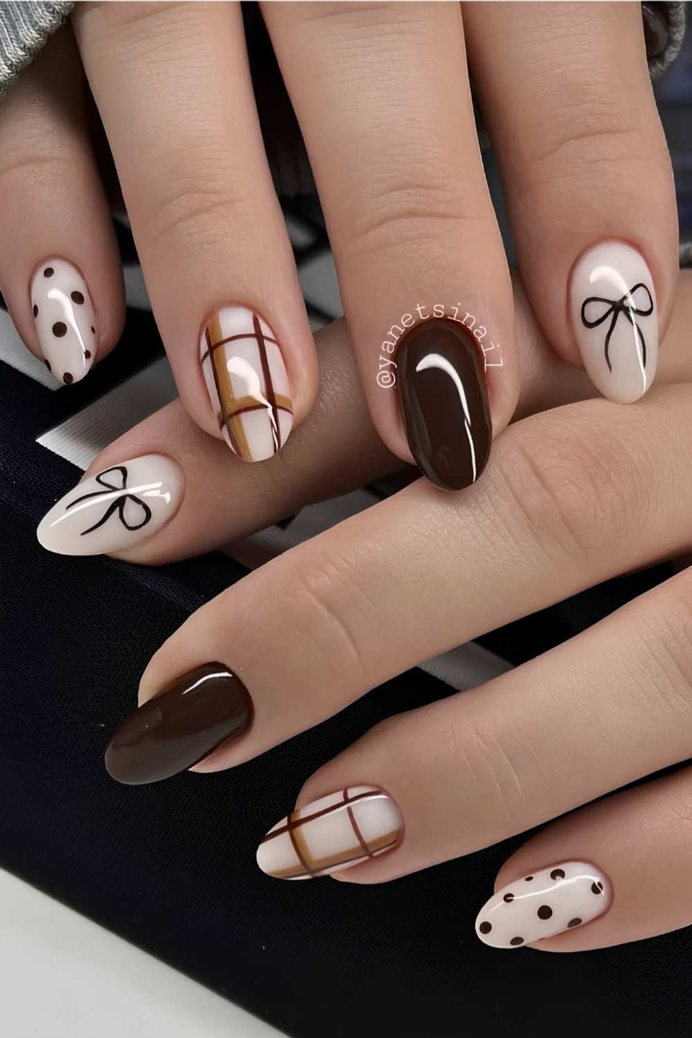 White and brown nails with bow and plaid art