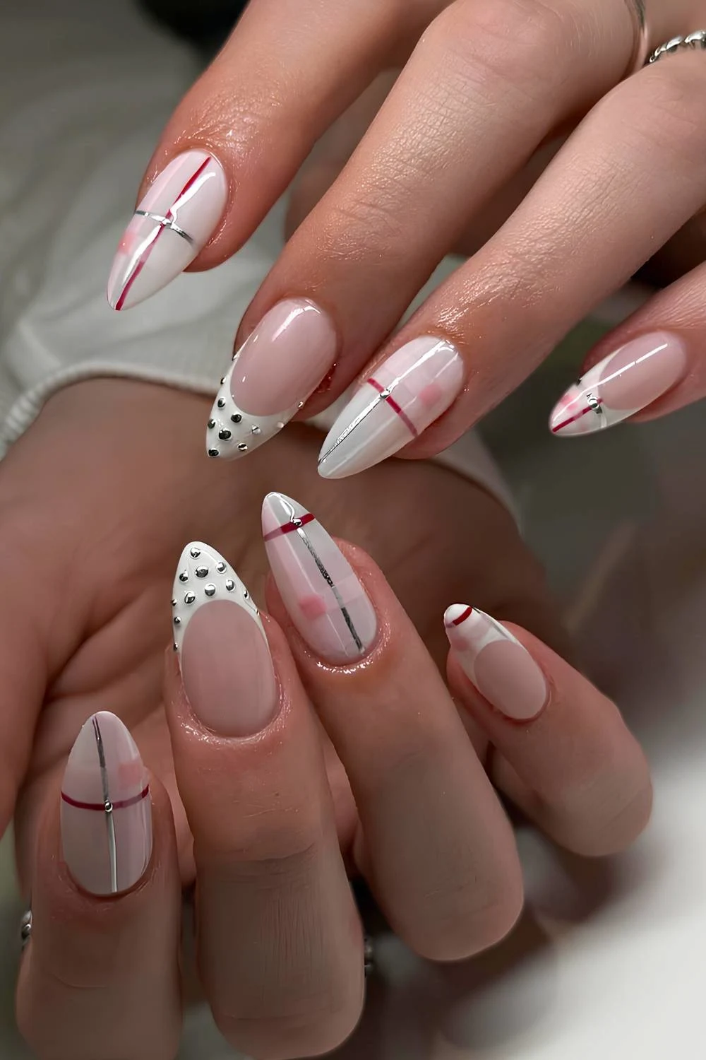 White and pink nails with plaid and silver beads