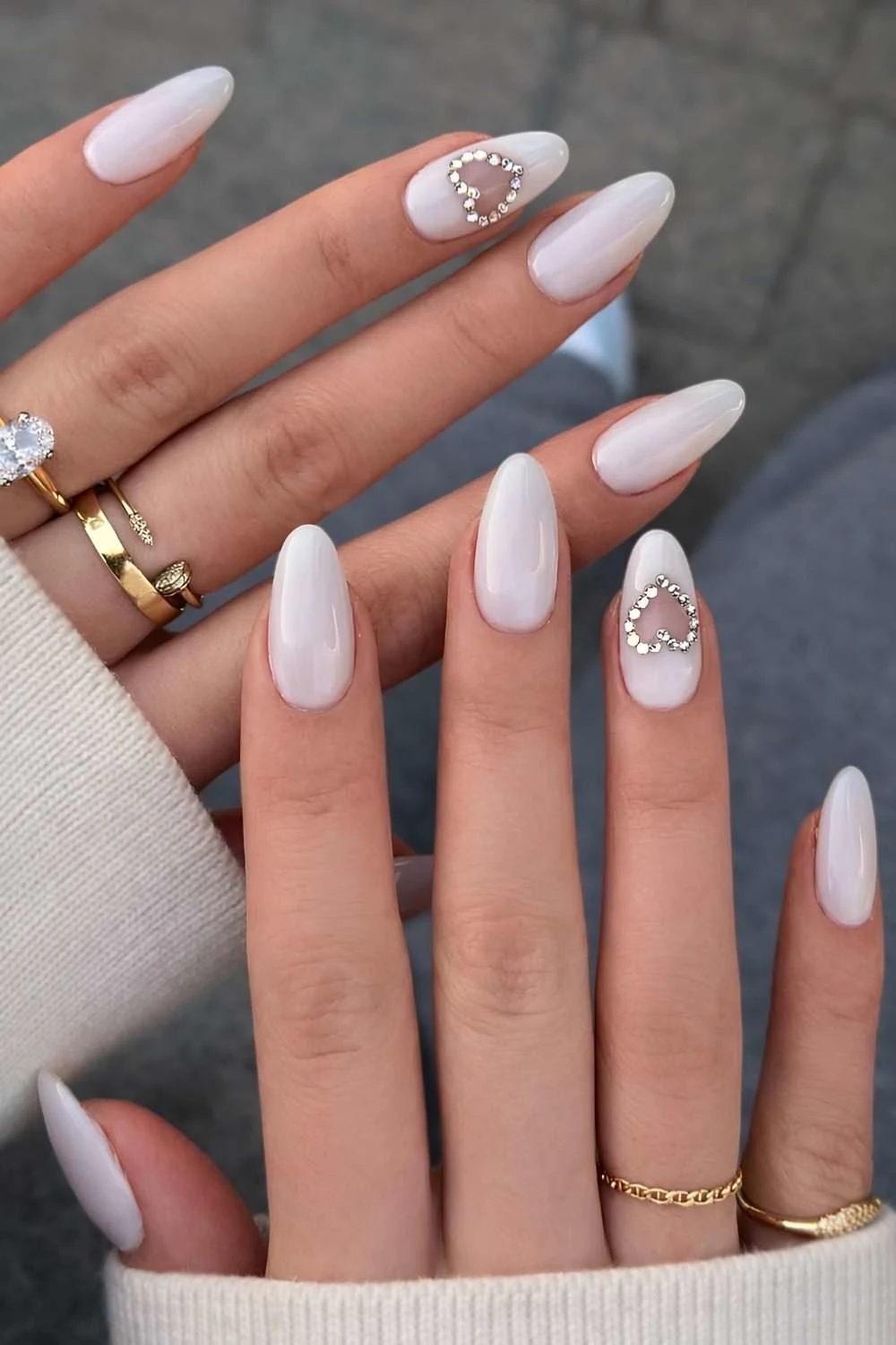 White nails with gem encrusted hearts