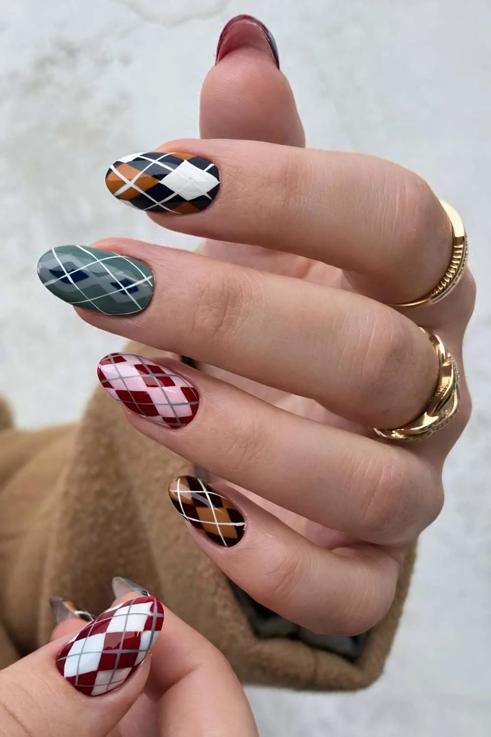 Argyle print nails in moody colors