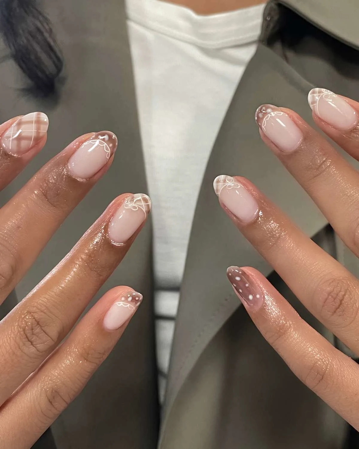 Brown and white mani with plaid and fawn print