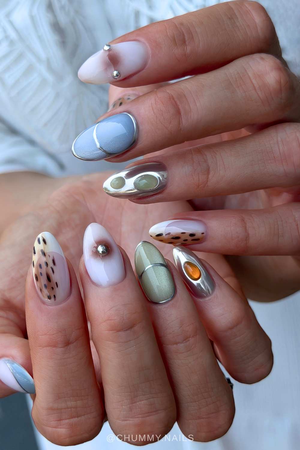 Colorful mani with cat eye and bambi print accents