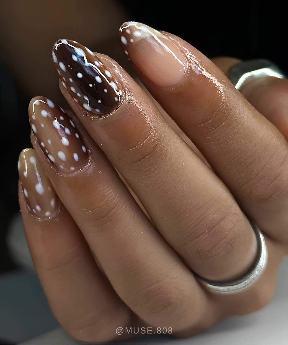 Deep brown and white deer print manicure