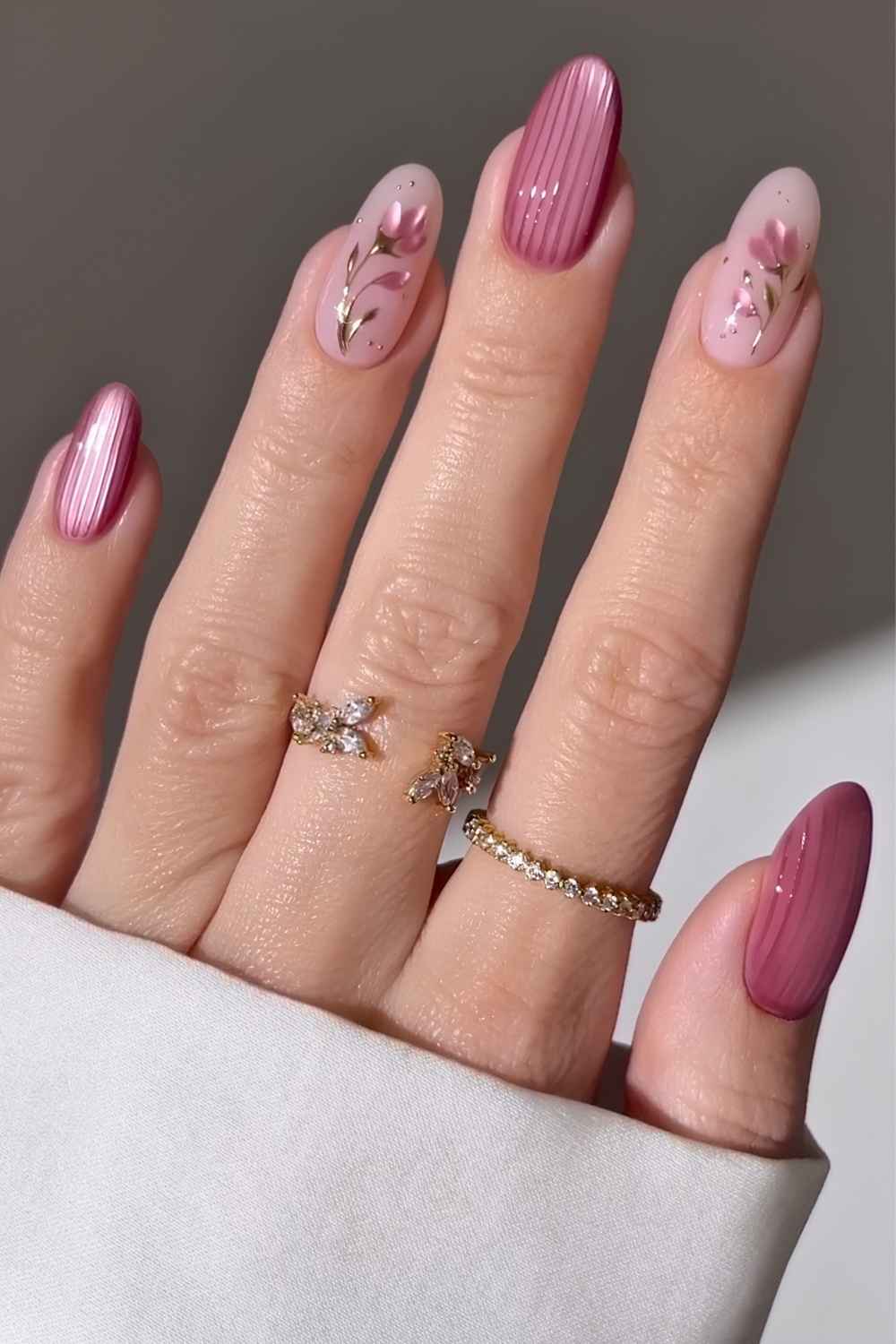 Deep pink ribbed glass mani with flowers