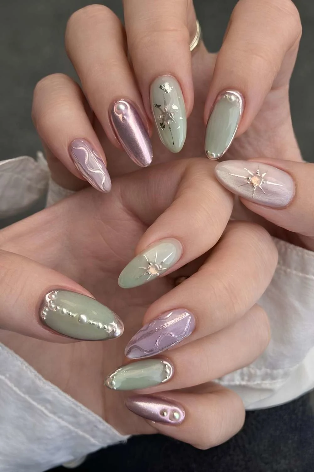 Jade green and rose gold manicure