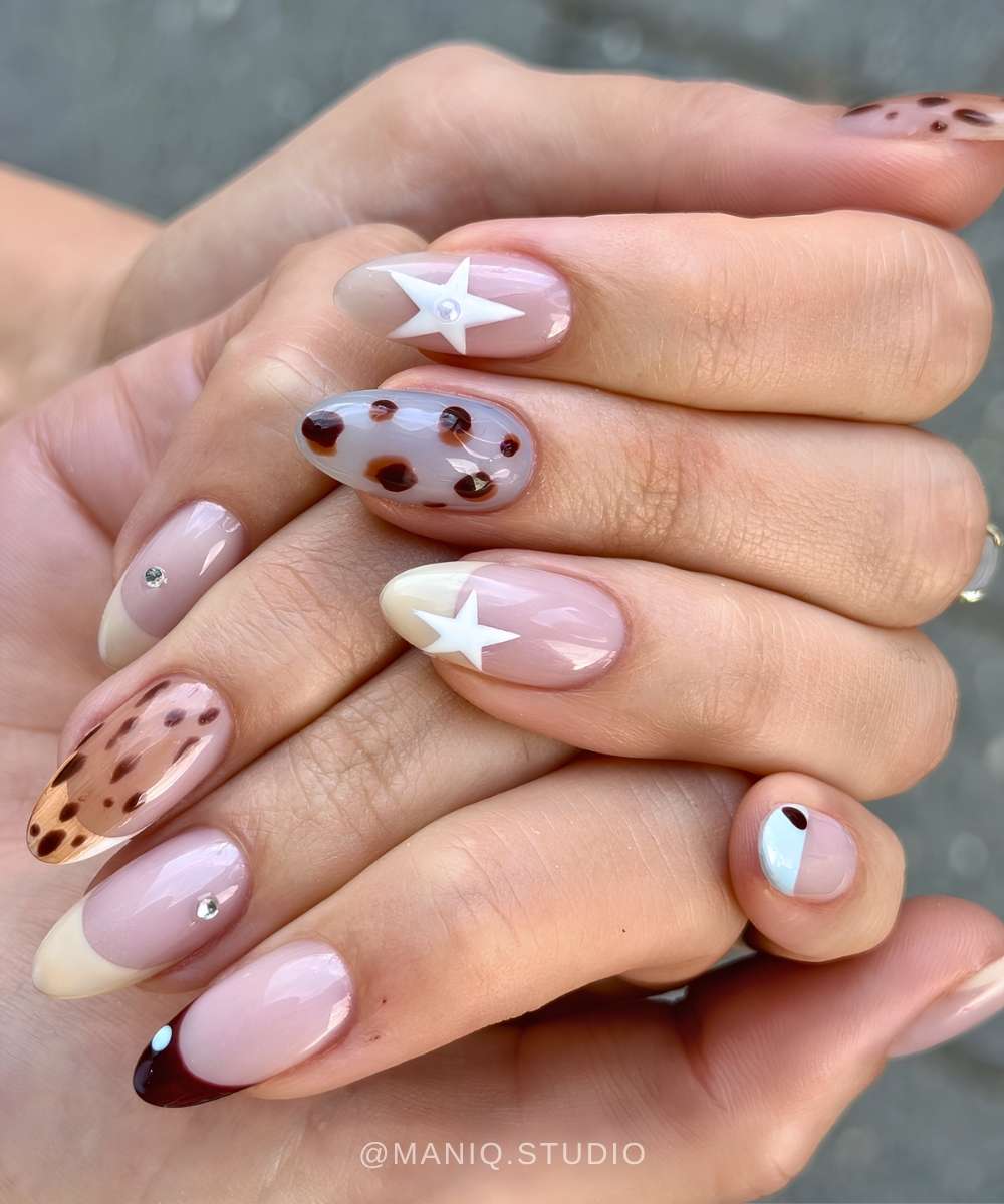 Mismatched nails with stars and fawn print
