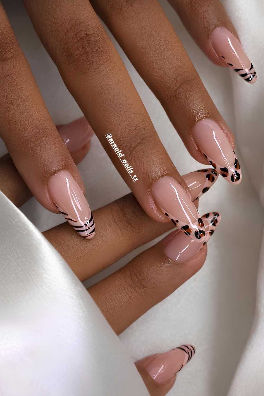 Neutral French manicure with accent animal print