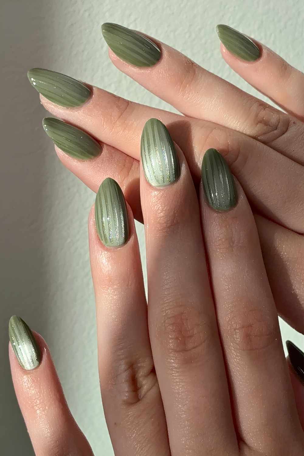 Olive green ribbed glass manicure