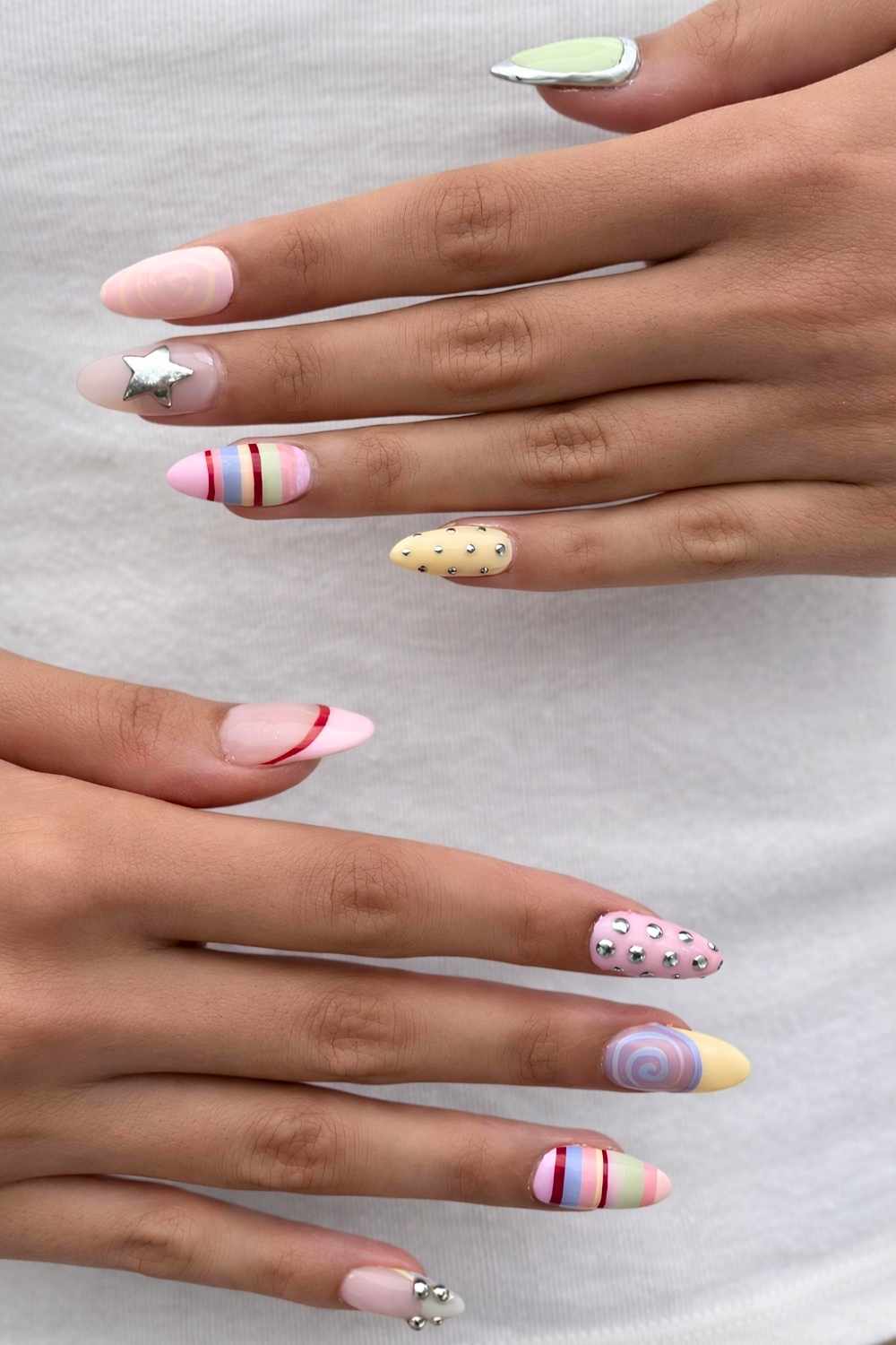 Pastel nails with mixed prints and patterns