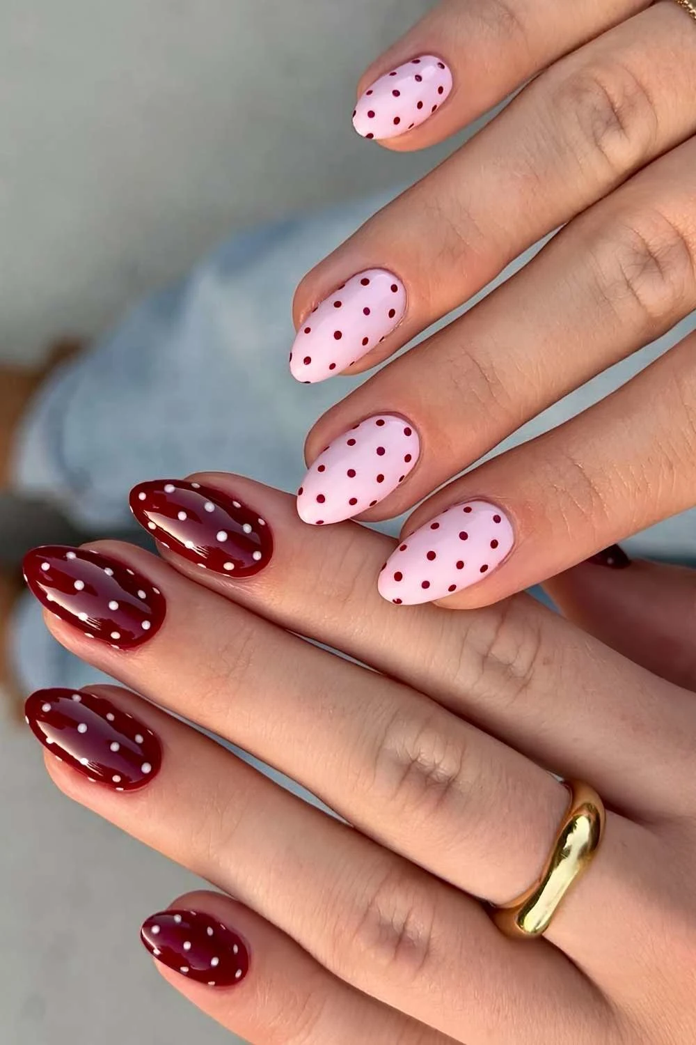 Pink and burgundy nails with polka dots