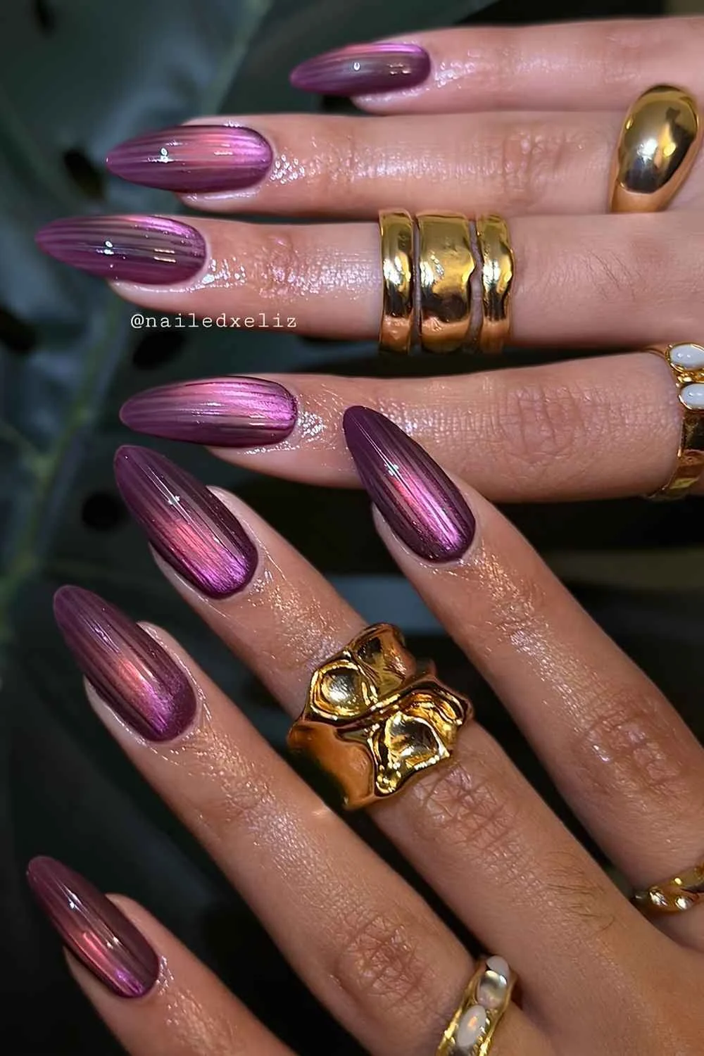 Purple ribbed cat eye nails