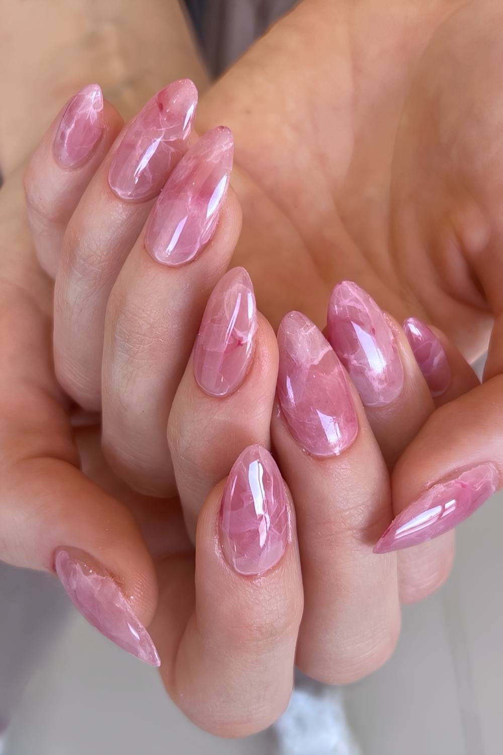 Almond pink marble manicure