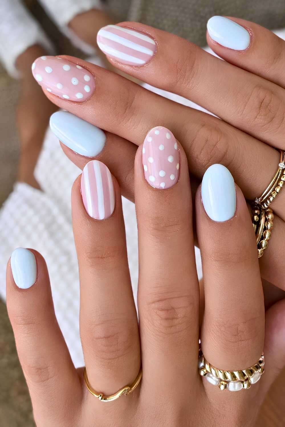 Baby blue nails with stripes and dots