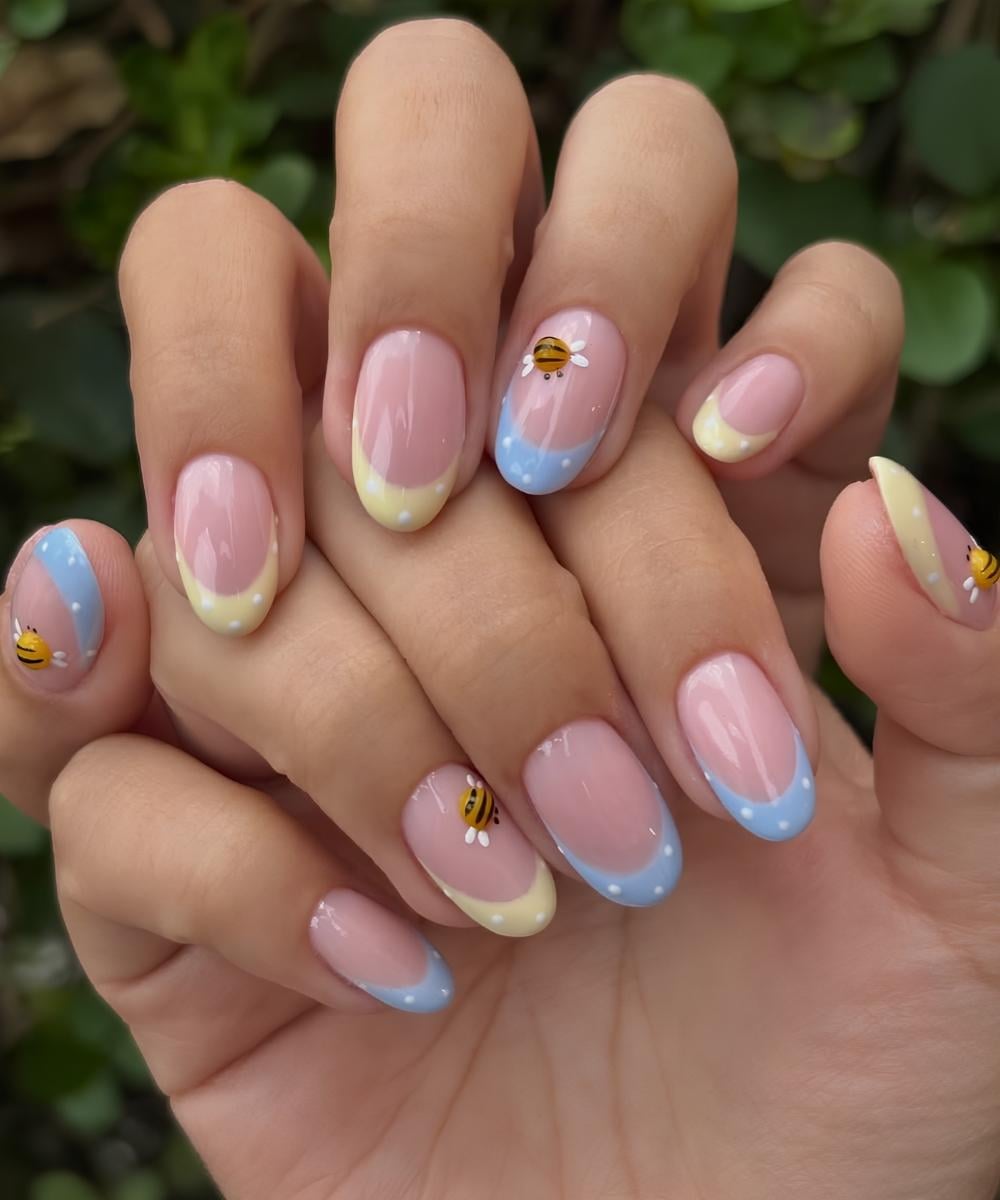 Blue and yellow french nails with dots and bees