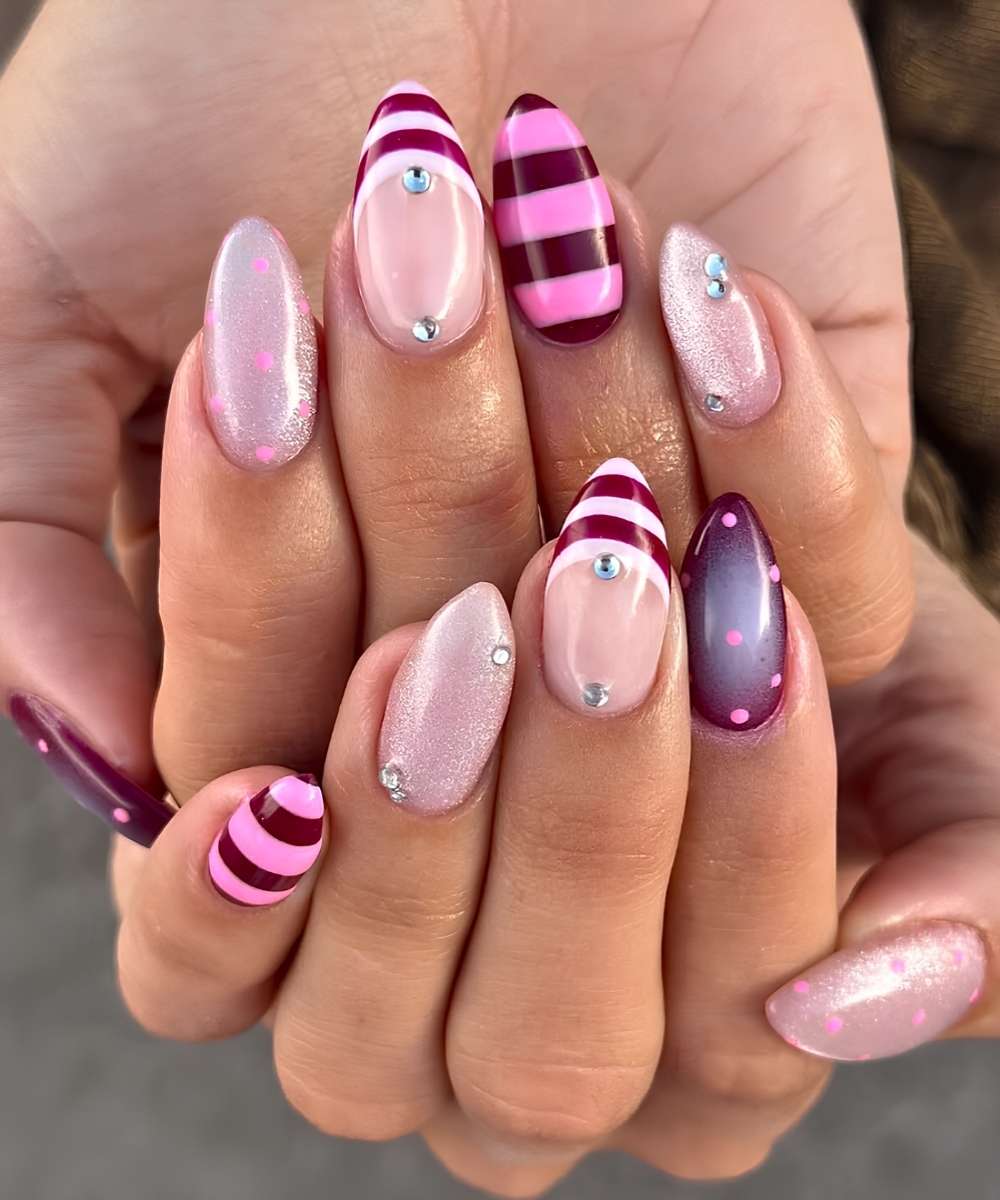 Burgundy and pink mani with dots and stripes