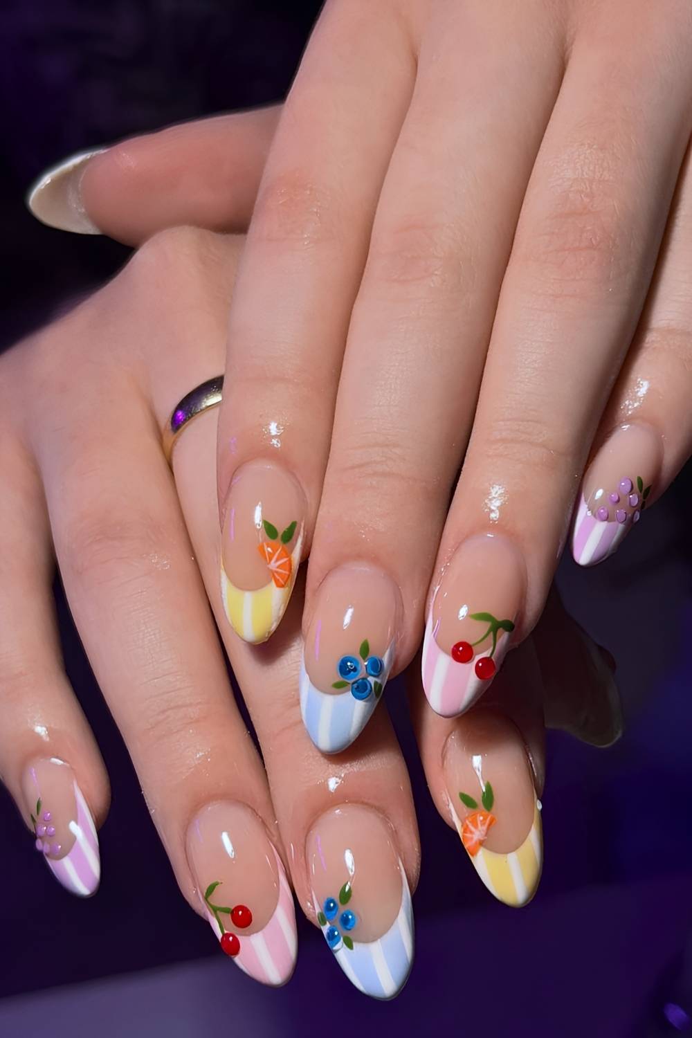 Colorful striped French nails with fruit art