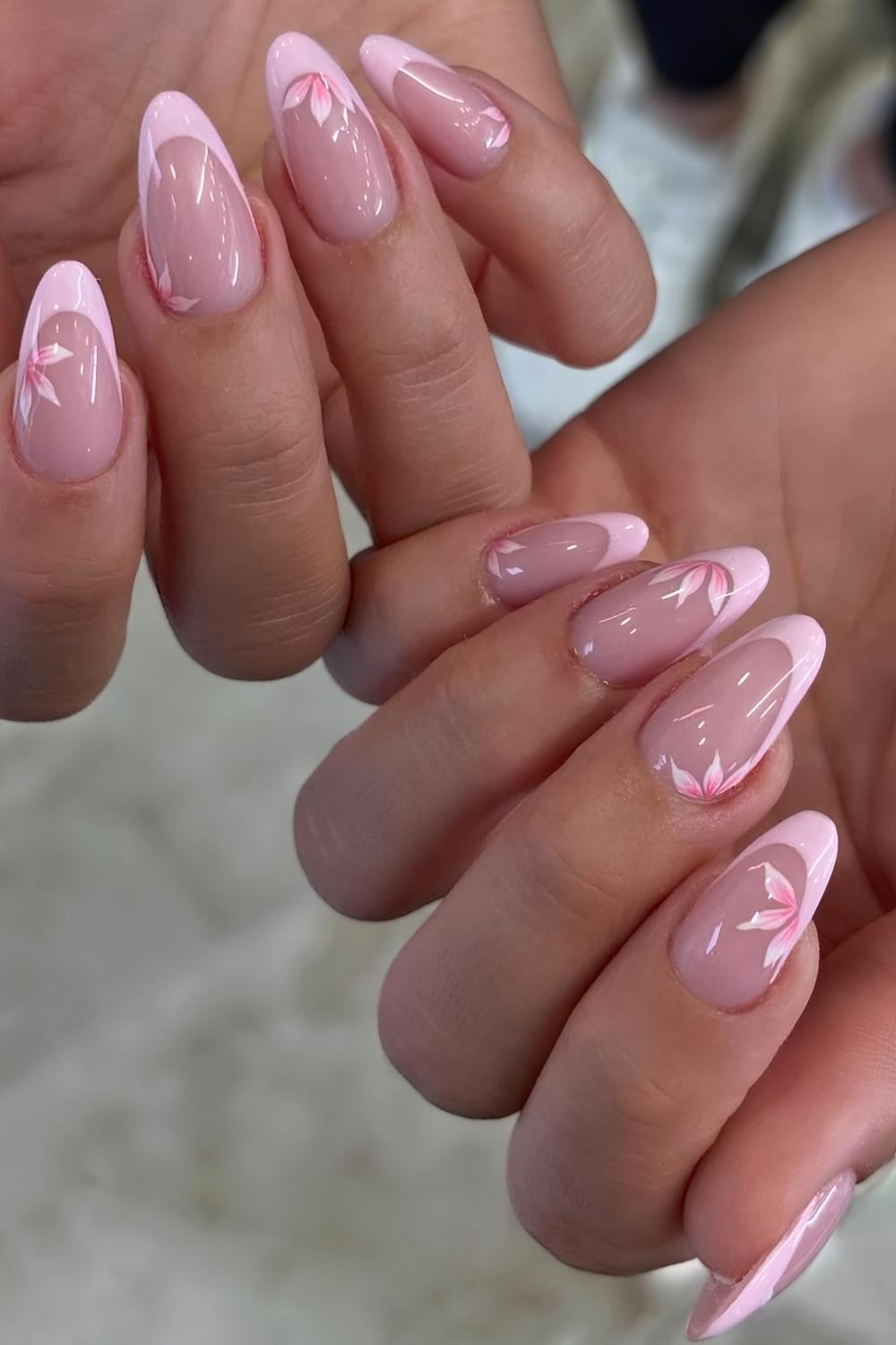 Light pink floral French tip manicure