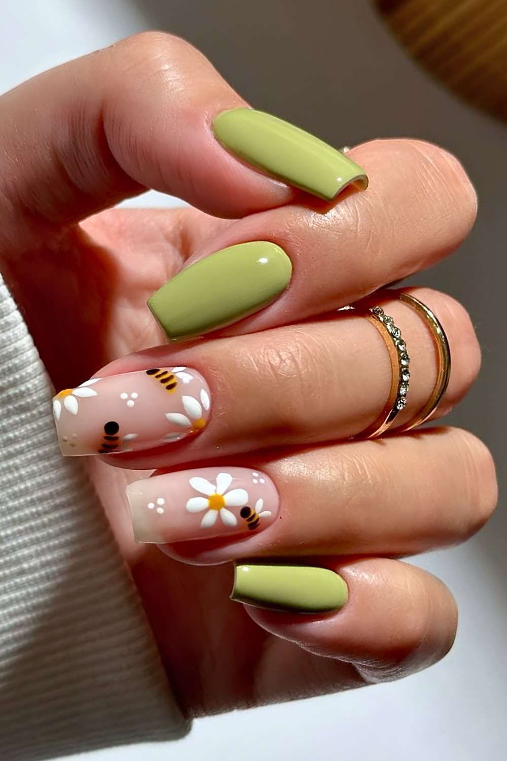 Matcha green nails with daisy and bee art