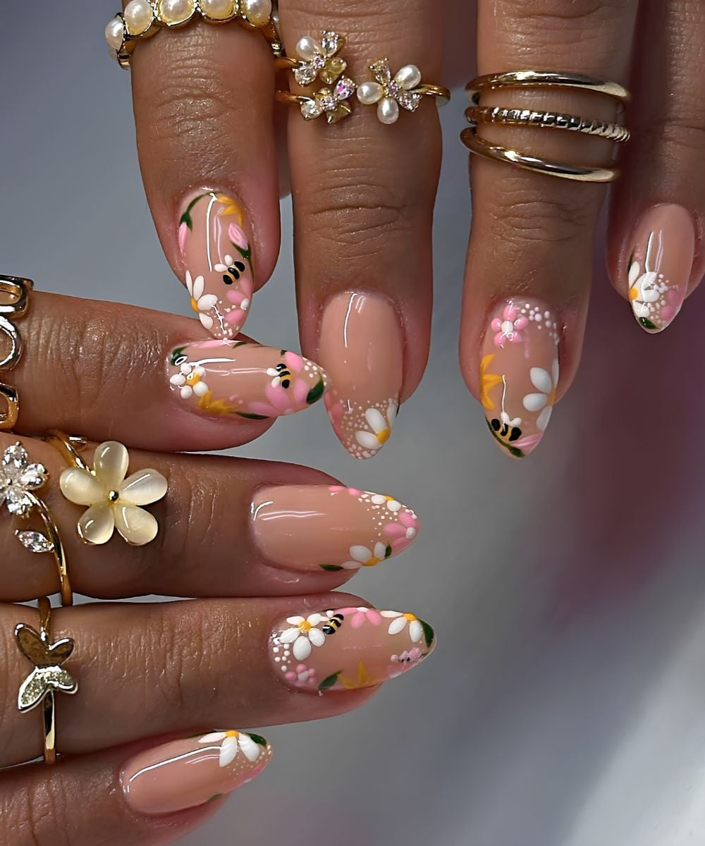 Milky nails with spring flower and bee art