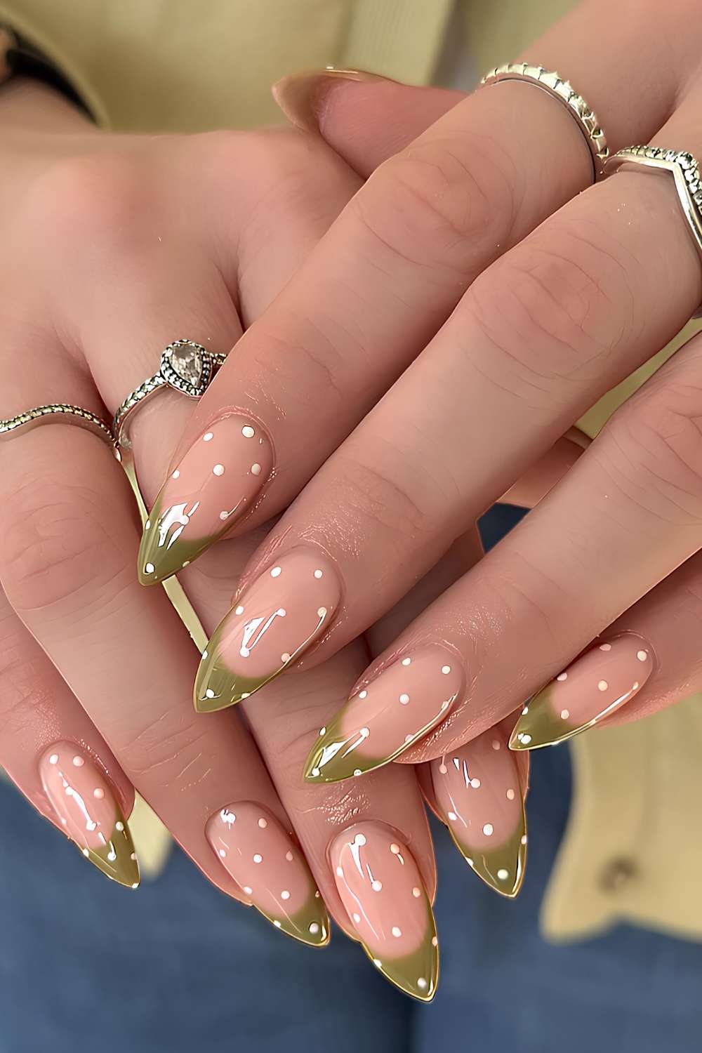 Olive green French nails with polka dots