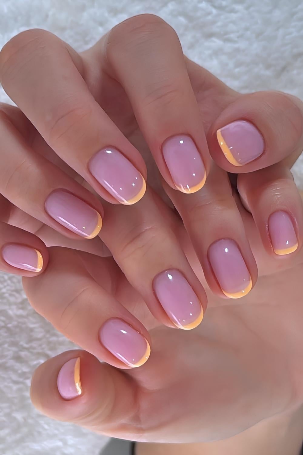 Peach micro French tip manicure