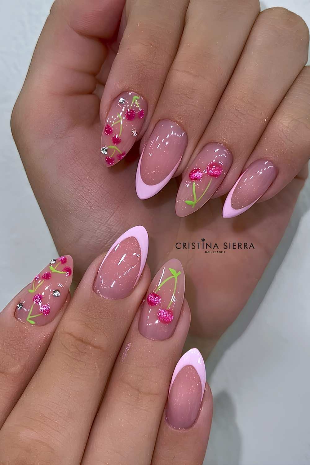 Pink French nails with velvet cherry accents