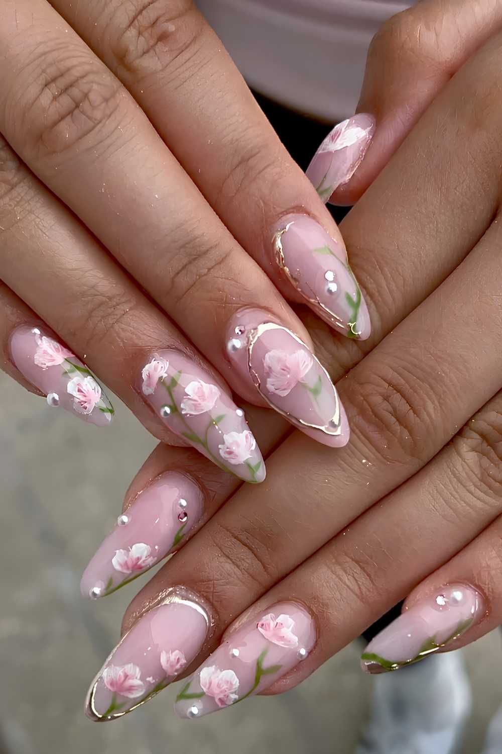 Sheer nails with roses and gold detailing