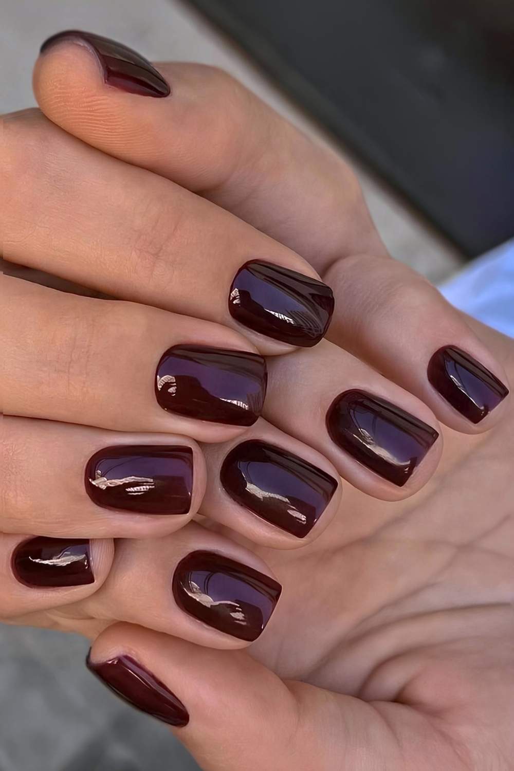 Short dark plum mani
