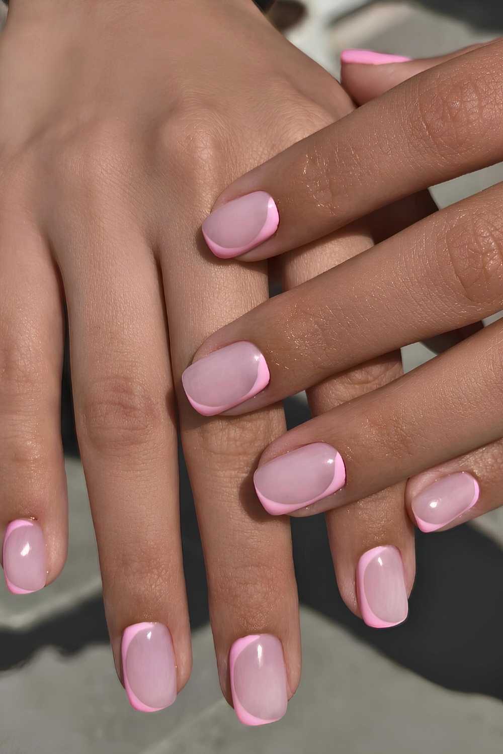 Short pink nails with negative space design