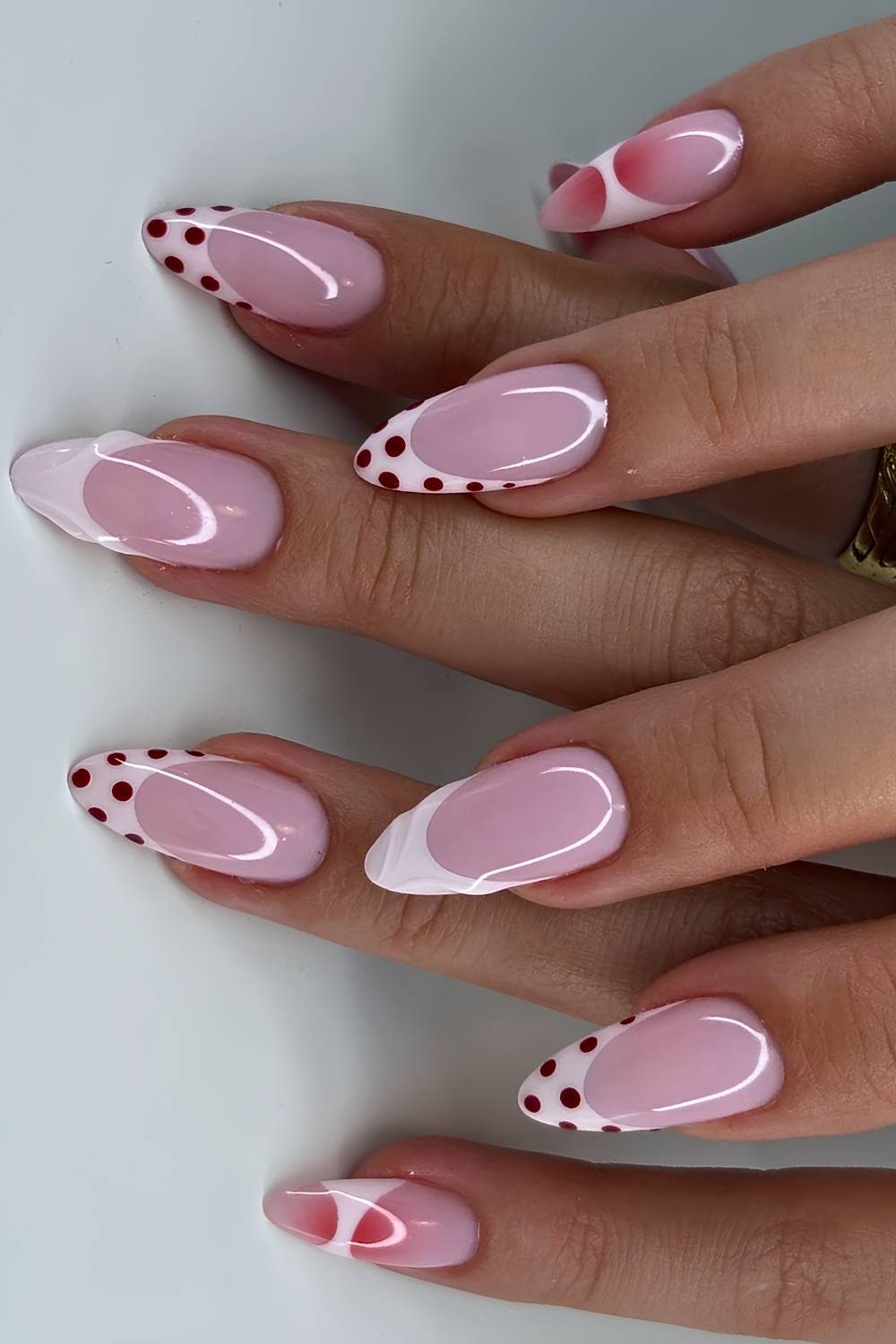 White French mani with polka dot accents