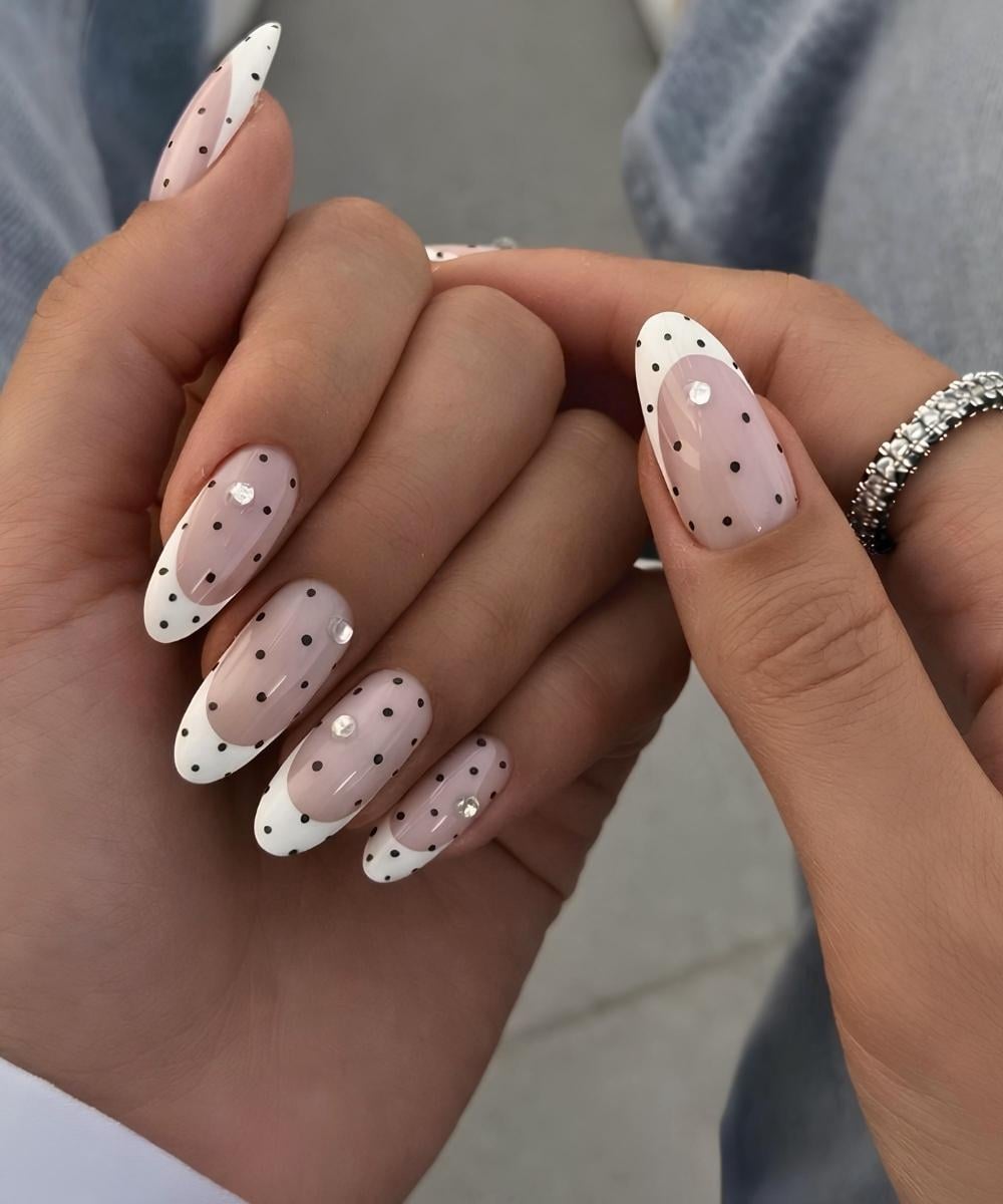 White French mani with polka dots and rhinestones