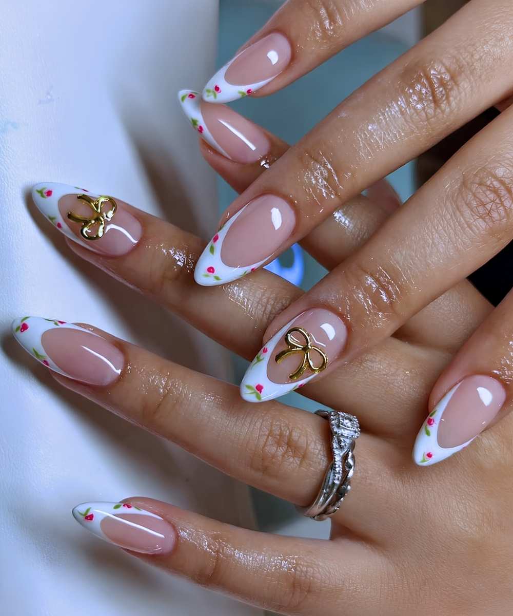 White French nails with micro roses and bows