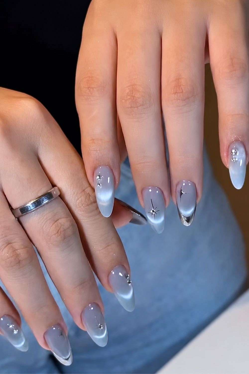 Blue cat eye mani with silver French tips
