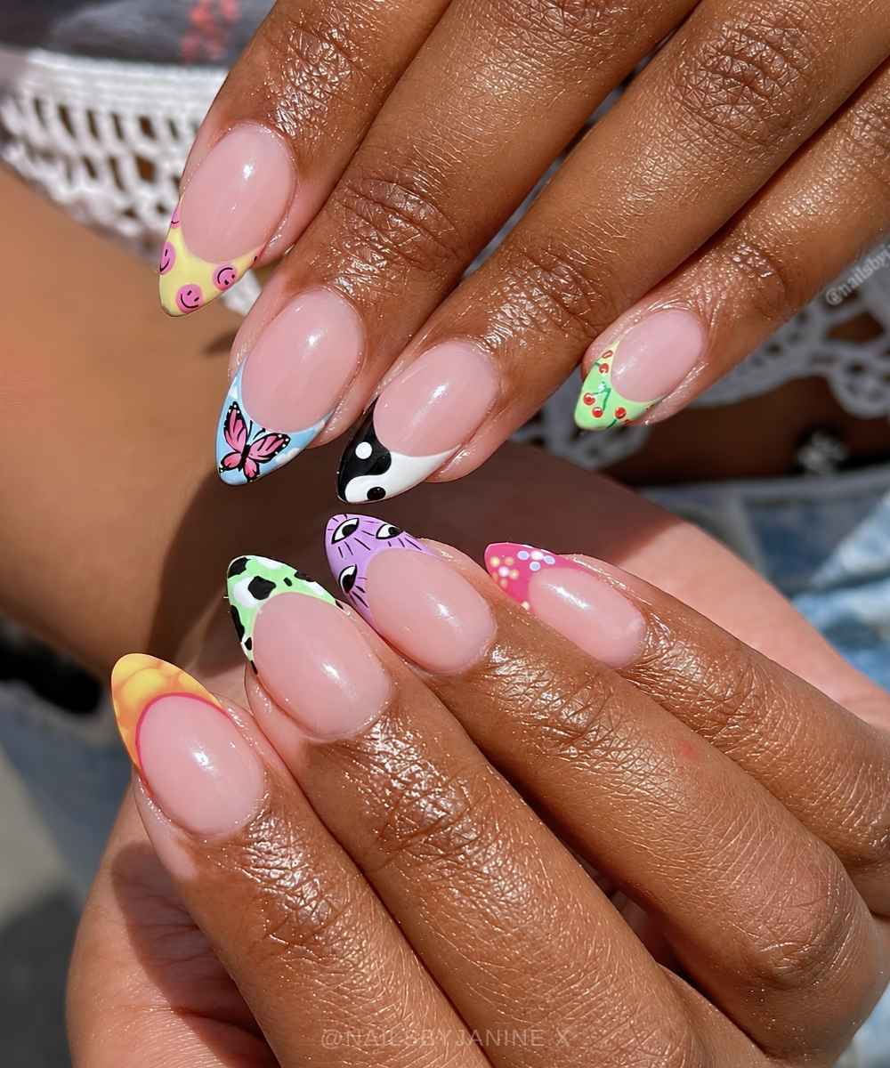 Colorful French nails with y2k iconography