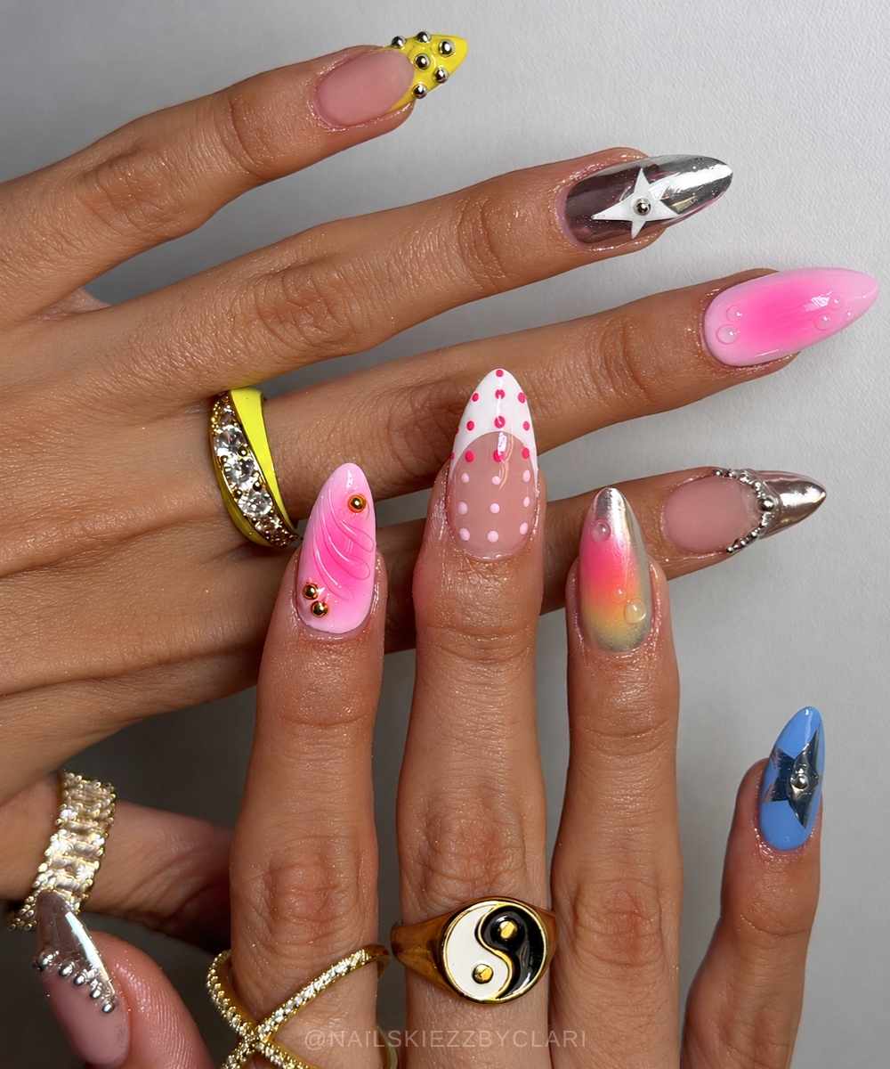 Colorful mismathched nails with stars and chrome