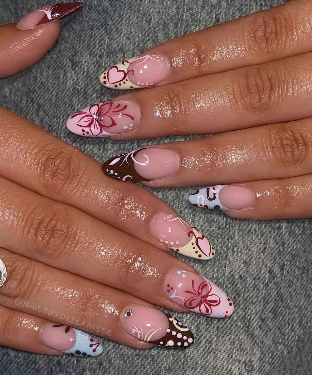 Earthy skittle French mani with boho motifs