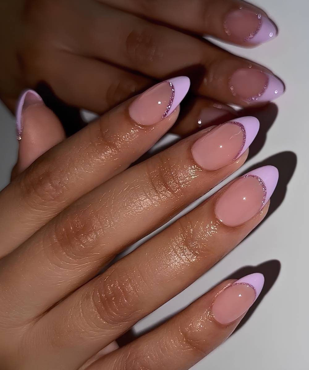 Lilac French nails with glitter outlines